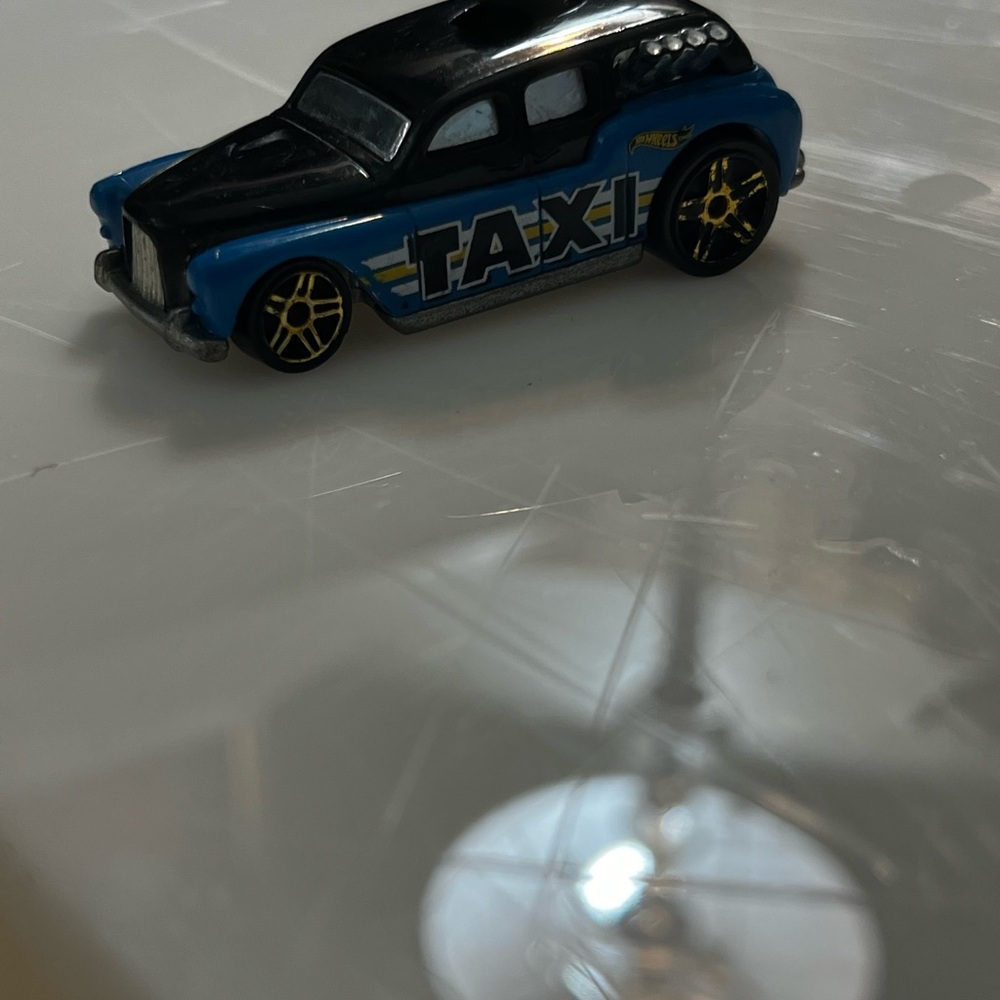 Hot Wheels Mattel Blue and Black Toy Taxi Car